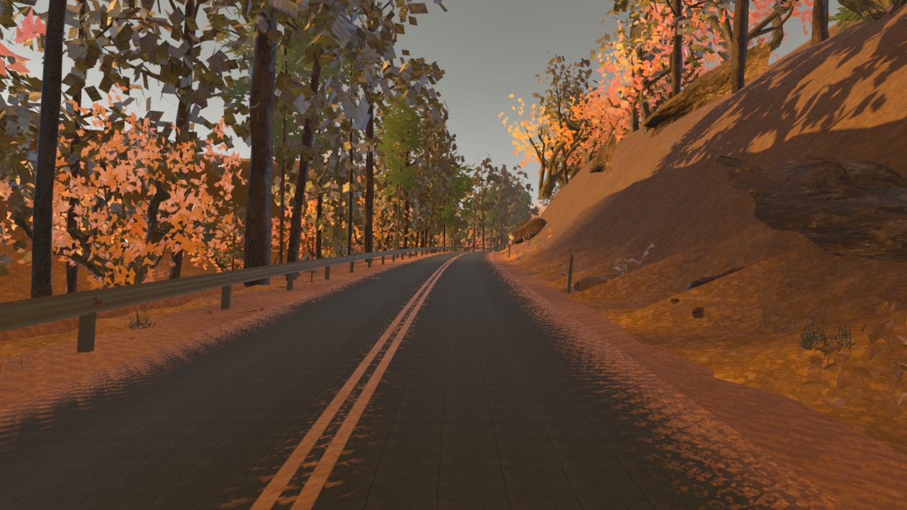 Grand Scenic Route environment in Forest Drive showing steel W-beam guardrails and golden-hour mountain slopes